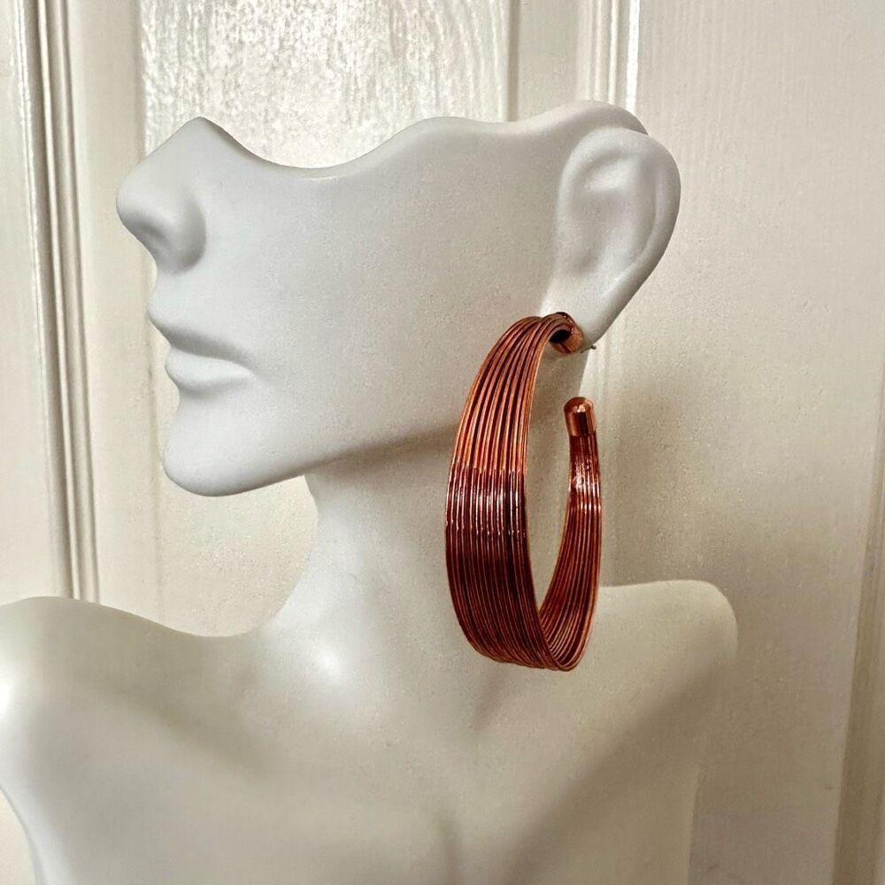 Copper tone hoop earrings